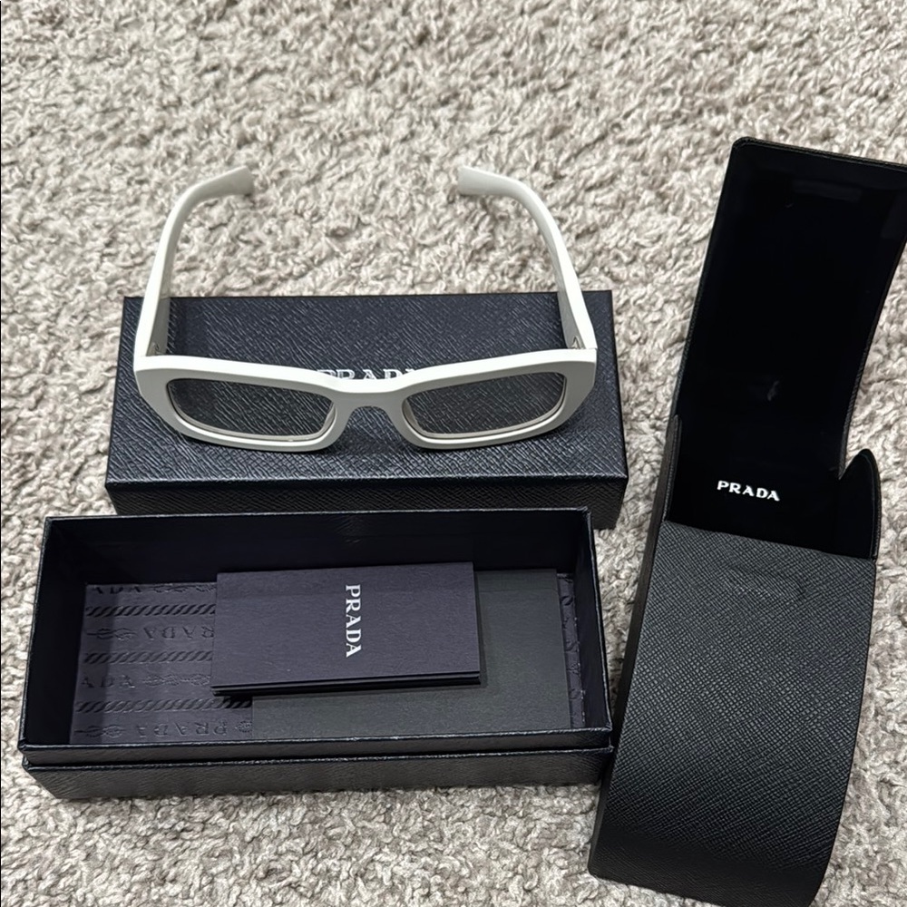 Prada White Glasses Sleek Design